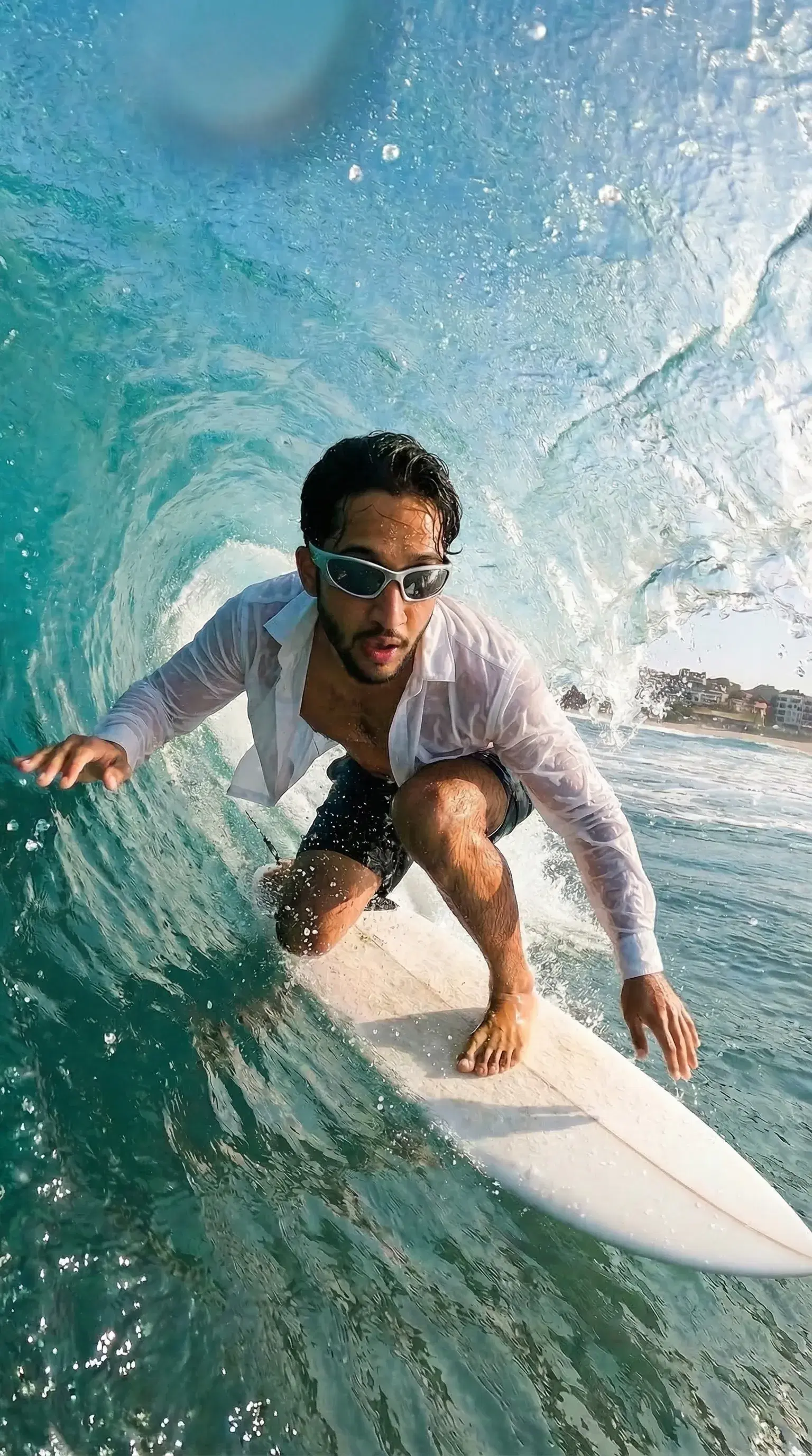 Surfer riding ocean wave - Gallery 1